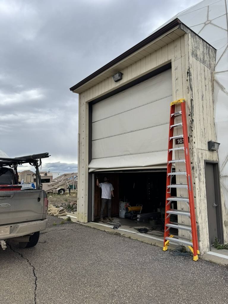Exteriors Denver crew on a service call at a commercial building